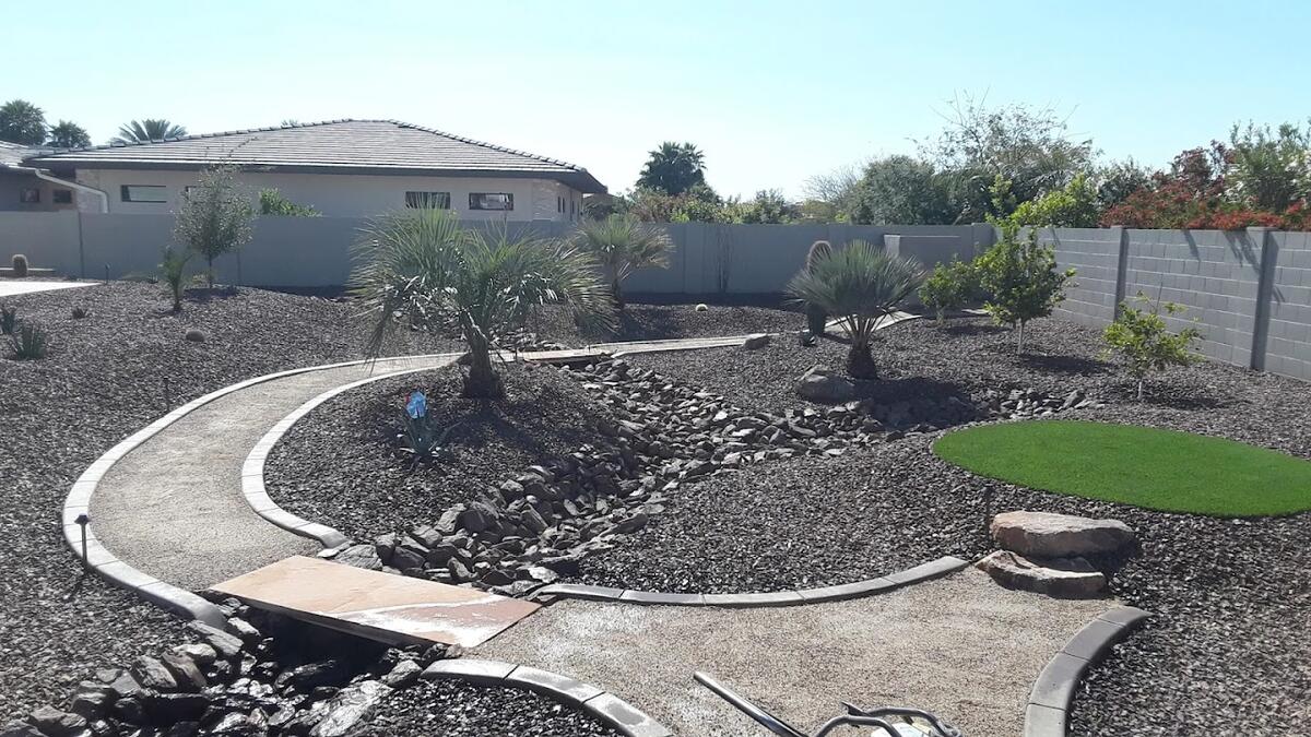 Desert landscape design with winding path in Queen Creek, AZ