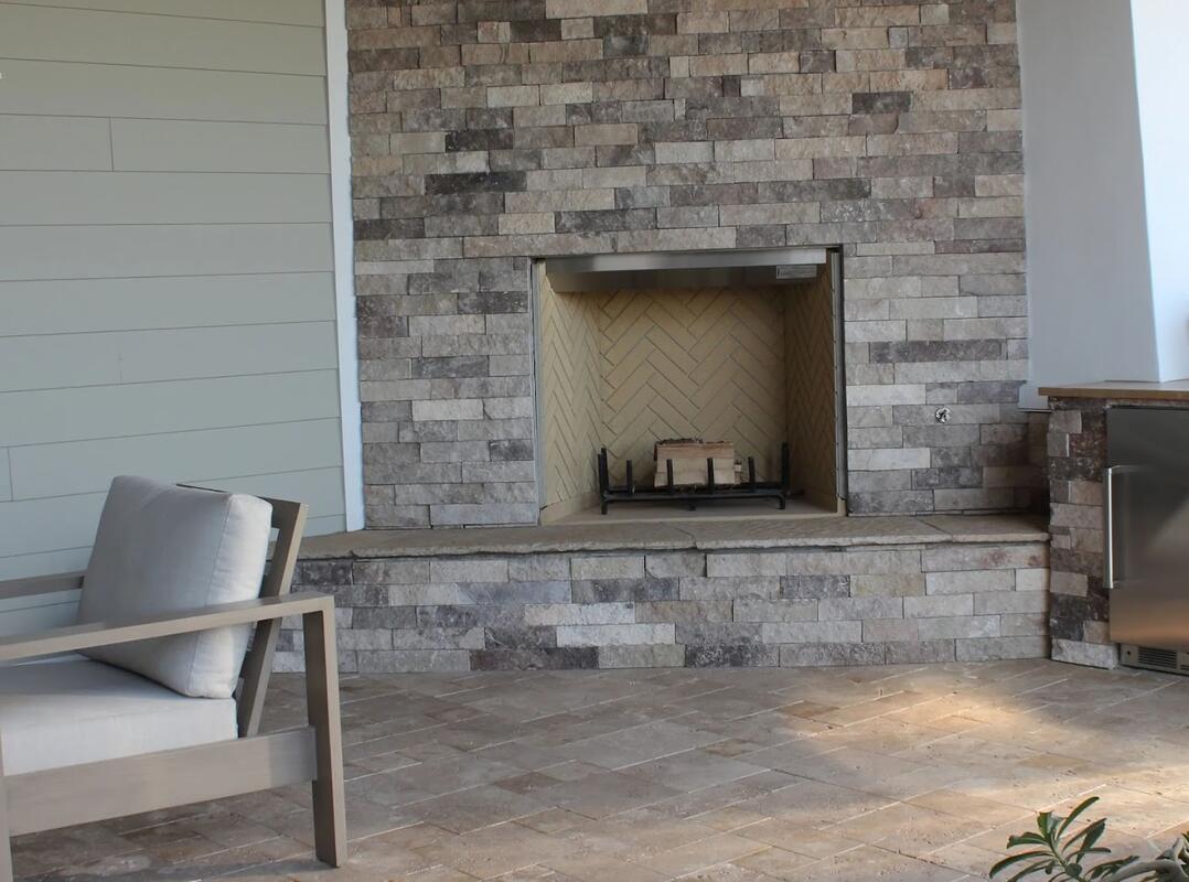 Stone outdoor fireplace in Scottsdale, AZ